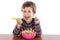 Child eating salad