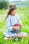 Child eating strawberries in a field