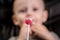 Child eats candy. Boy has caries on teeth. Dental medicine and healthcare