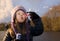 Child enjoys playing with soap bubbles at sunset