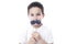 Child with fake moustache.