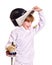 Child in fencing costume holding epee .