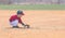 Child Fields a Ground Ball During a Baseball Game