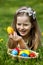 Child find easter egg outdoor.