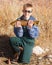 Child fishing - holding a large trout