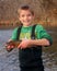 Child fishing - holding a Rainbow Trout