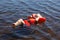 Child floating with life vest