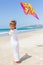 Child flying kite beach outdoor.