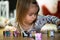 Child focused on playing with toy blocks