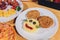 Child food. Funny food. Plate with cutlets and mashed potatoes in the form of a monkey faces. Children`s menu.