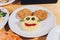 Child food. Funny food. Plate with cutlets and mashed potatoes in the form of a monkey faces. Children`s menu.