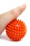 Child foot with plastic massage ball