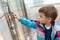 Child in front of elevator