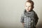Child. funny little boy in scurf. Fashion Children. 4 years old. plaid shirt