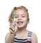 Child girl brush her teeth on white background.Toddler dental concept.Tooth hygiene. Toothbrush