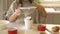 child girl decorating cake in a mug, baking at home with kids, dessert preparation