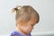 Child girl first hair style - tiny tail, profile of baby girl ch