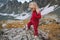Child girl hiking barefoot in mountains travel adventure family vacations trip healthy lifestyle