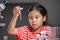 Child girl making chemical experiment in the laboratory