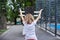 Child girl on sports outdoor simulator, back view