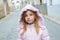 Child girl tourist walking in traditional Spain village