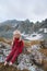 Child girl walking in mountains barefoot happy smiling face family vacations