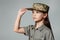 child girl wear military uniform. kid dressed like a soldier