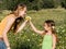 Child giving gift of flowers