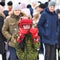 A child in gloves and a helmet for sports combat. Western Siberia, Russia