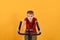 The child goes in for sports on a stationary bike, fitness for children