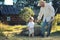 Child and grandfather rural field