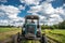 child and grandpa on a tractor rural village countryside