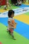 Child, green, games, indoor, and, sports, yellow, day, play, leisure, toddler, fun, toy, recreation, sport, venue, girl, competiti