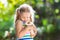 Child with guinea pig. Cavy animal. Kids and pets.