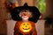 Child in Halloween costume. Kids trick or treat