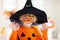 Child in Halloween costume. Kids trick or treat