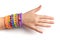 Child hand with colorful rubber rainbow loom bracelets