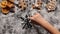 Child hand drawing big snowflake in the flour prepared