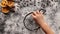 Child hand drawing a christmas bauble in the flour