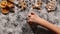 Child hand drawing christmas star twinkles in the flour