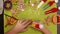 Child hands decorating christmas cookies