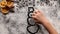 Child hands drawing a snowman in the flour