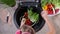 Child hands washing lettuce leaves