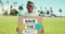 Child, happy face and protest poster for eco friendly, sustainability and saving planet. Outdoor, black boy and