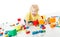 Child happy playing blocks over white