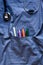 Child health care with stethoscope and thermometer in doctors pocket top view mock up