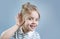 Child hear. Hearing loss, symptoms and treatment concept. Kid portrait.Gossip and news