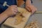 A child with the help of a geologist\'s kit extracts a jasper in a plaster cast