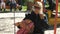 A child and his mother ride on a swing in the park on an autumn sunny day. Family day, birthday, rest