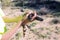 A child holding a Gila monster (Heloderma suspectum) - a poisono